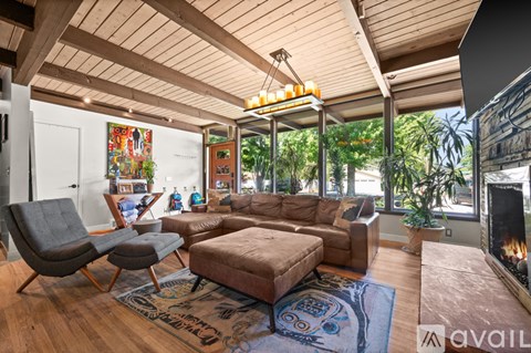 A living room with a fireplace and a couch.