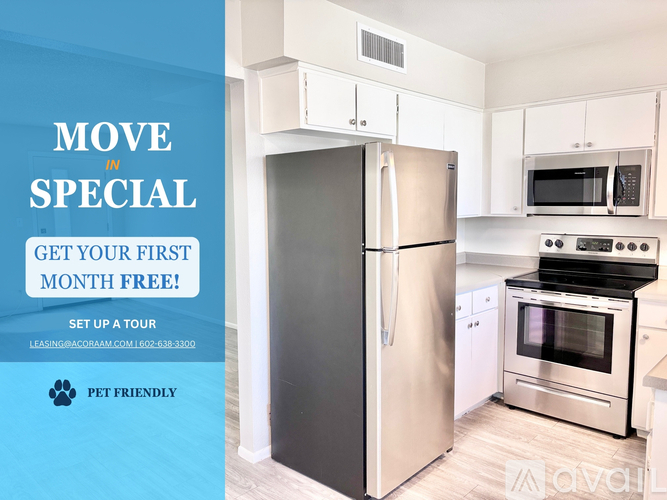 A kitchen with a refrigerator, microwave, and oven is advertised for a free first month.