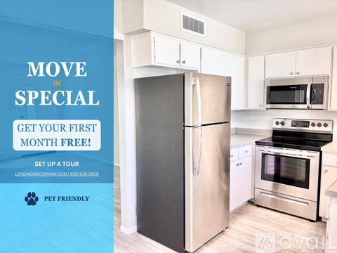 A kitchen with a refrigerator, microwave, and oven is advertised for a free first month.