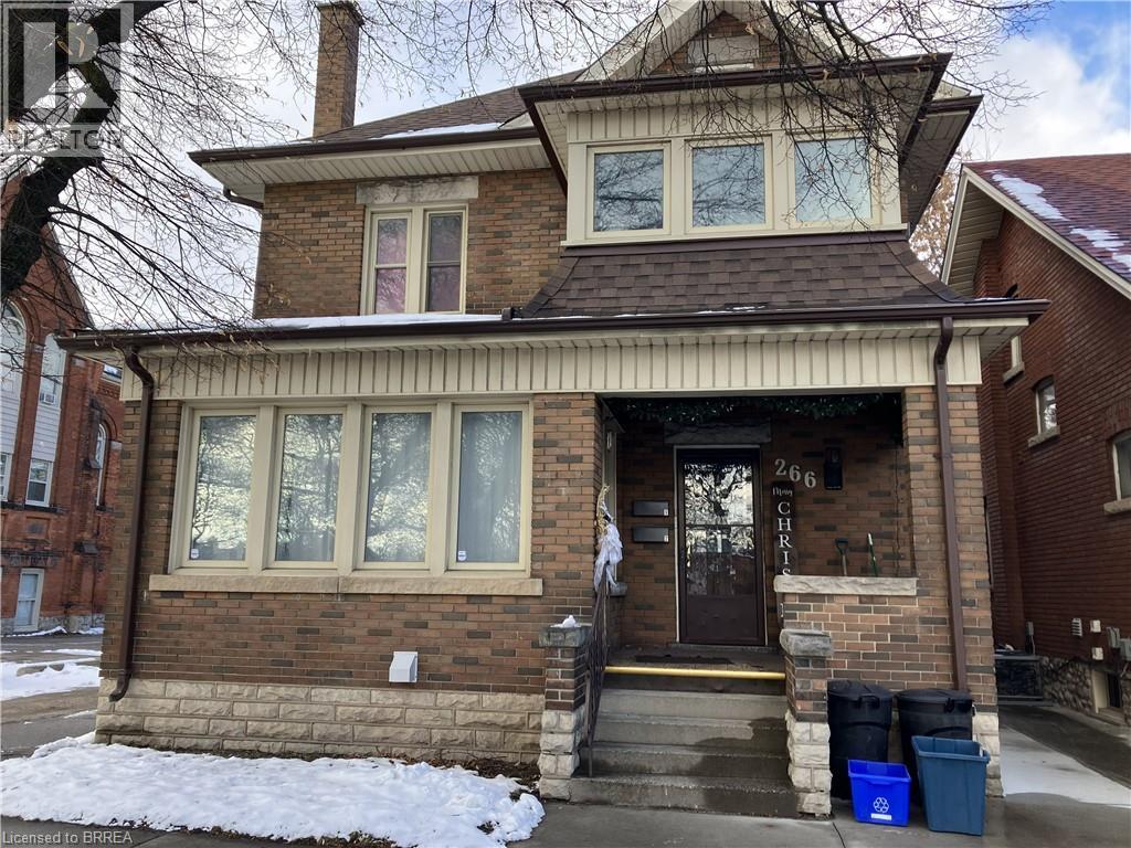 A house with the number 266 on the front door.