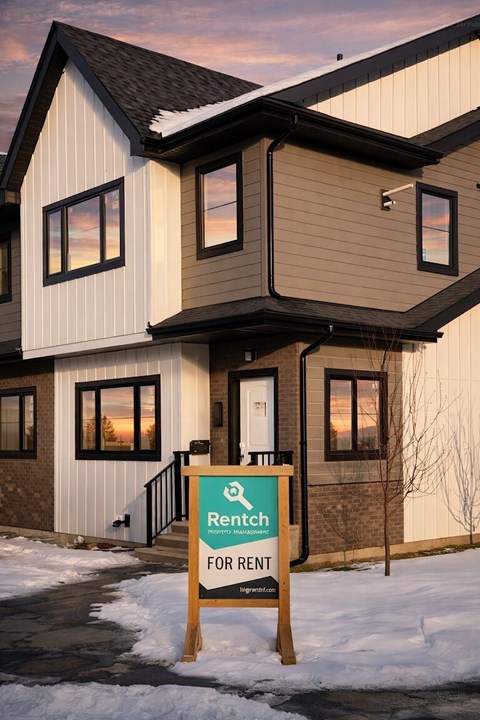 A house with a sign that says "Rent for Rent".