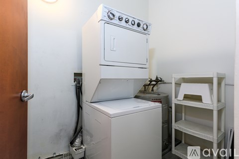 A white oven is installed in a kitchen.