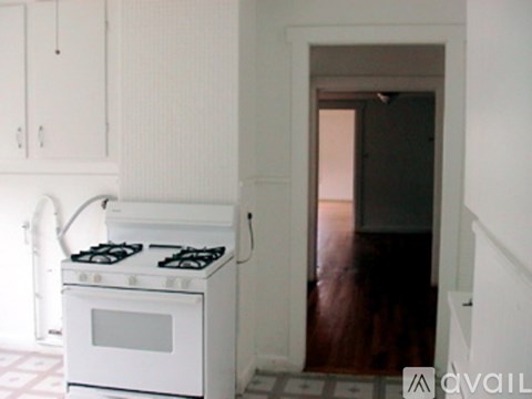 A white stove and oven in a kitchen.