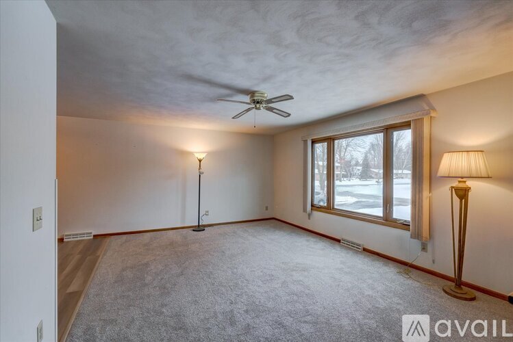 Two images of a lower bedroom with unit number 5534.