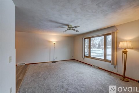 Two images of a lower bedroom with unit number 5534.