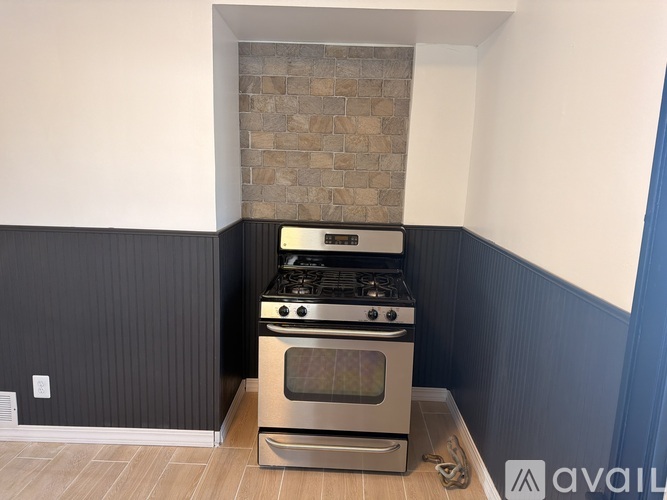 A modern kitchen with a stove and oven.