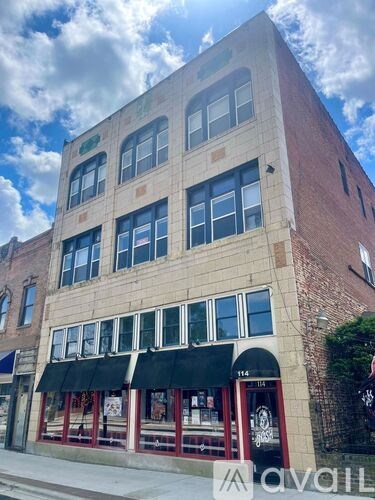 A building with the number 114 on it.