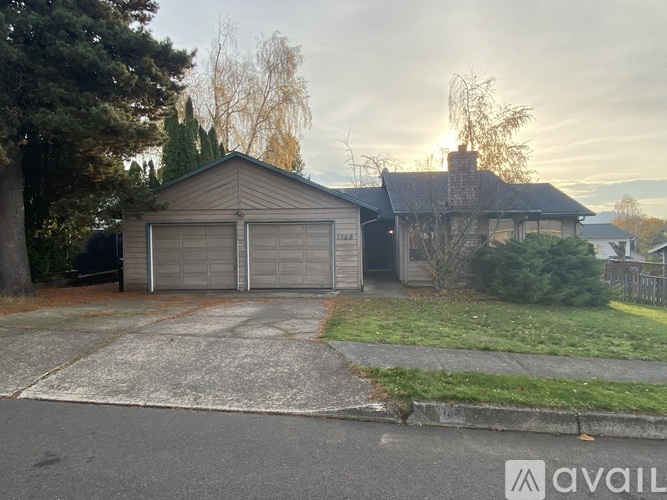 A house with a garage is available for sale.