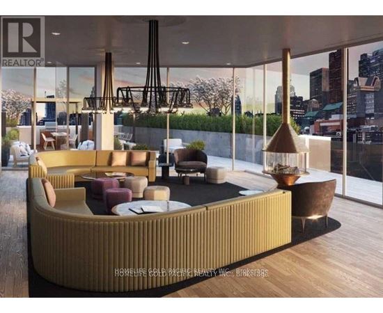 A modern living room with a curved sofa and a coffee table.