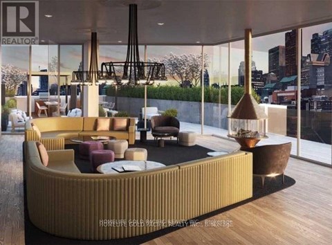 A modern living room with a curved sofa and a coffee table.