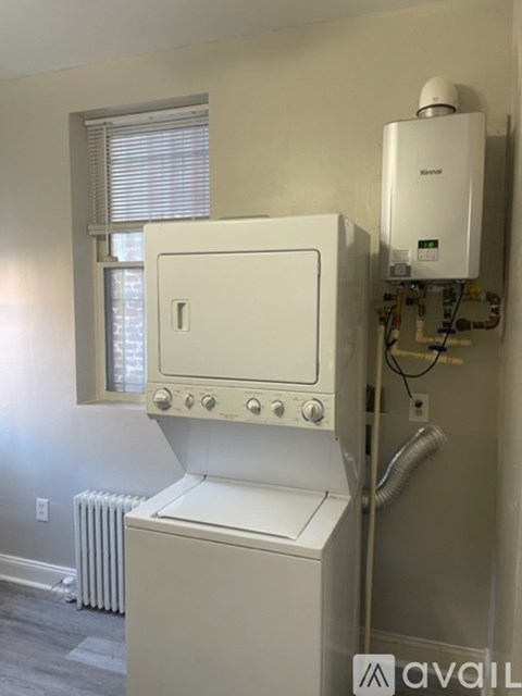 A white oven and stove top in a kitchen.