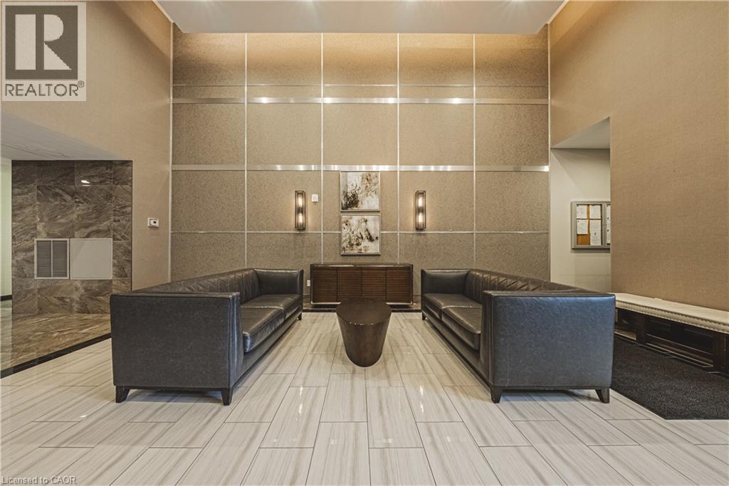 A spacious waiting area with a reception desk and comfortable seating.
