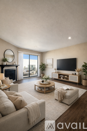 A modern living room with a fireplace and a flat screen TV.