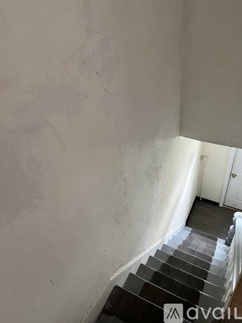 A staircase with a light shining on it.