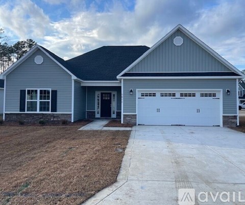 A two-car garage is attached to a house.