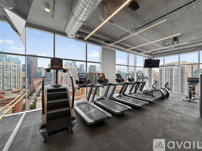 A gym with treadmills and exercise bikes is available for use.