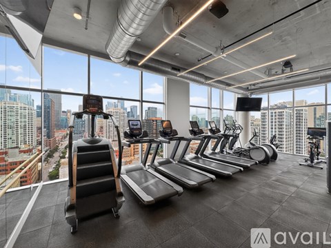 A gym with treadmills and exercise bikes is available for use.