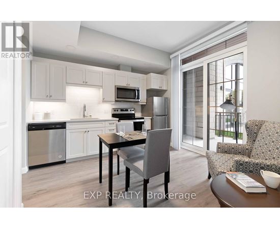 A modern kitchen with a dining table and chairs.