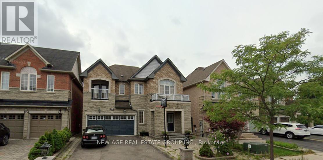 A house with a carport and a garage is for sale.