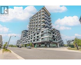 A modern multi-story building with a glass facade is the main focus of the image.