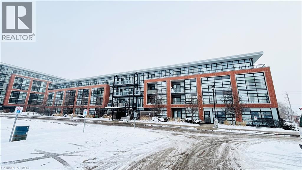 A large building with a lot of windows and a sign that says REALTOR.