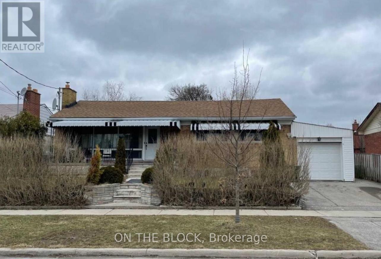 A house with the text "ON THE BLOCK, Brokerage" in front of it.