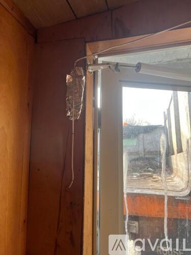 A window with a view of a construction site outside.