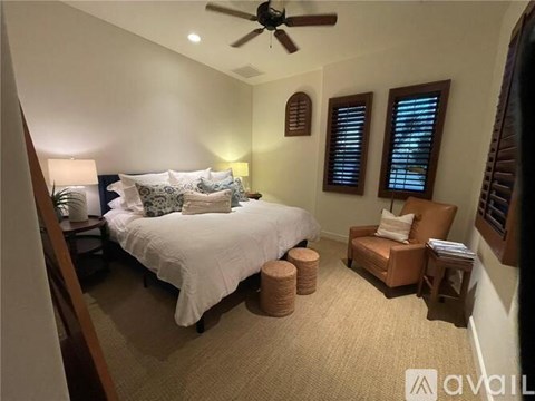 A kitchen with a table and chairs in the middle of the room.