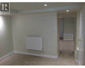 A room with a white radiator on the wall.