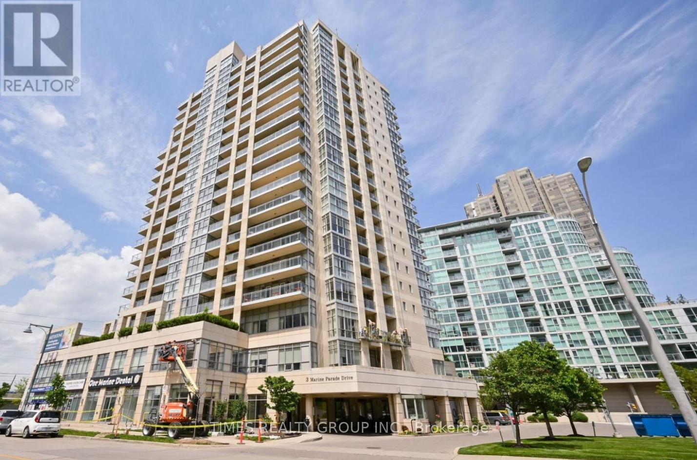 A tall building with a sign that says "REALTOR" on it.