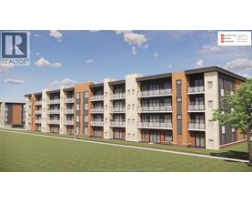 A rendering of a multi-story apartment complex with a clear blue sky in the background.