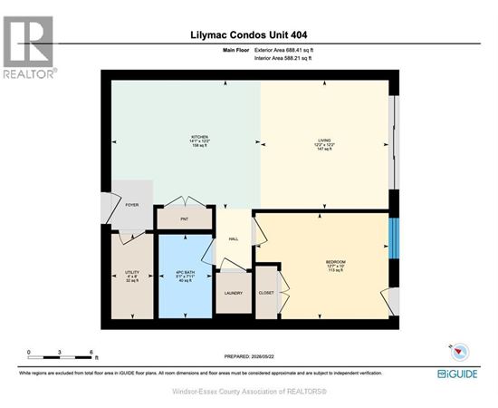 A floor plan for a Lilymac Condos Unit 404 with a kitchen, living room, and bathroom.