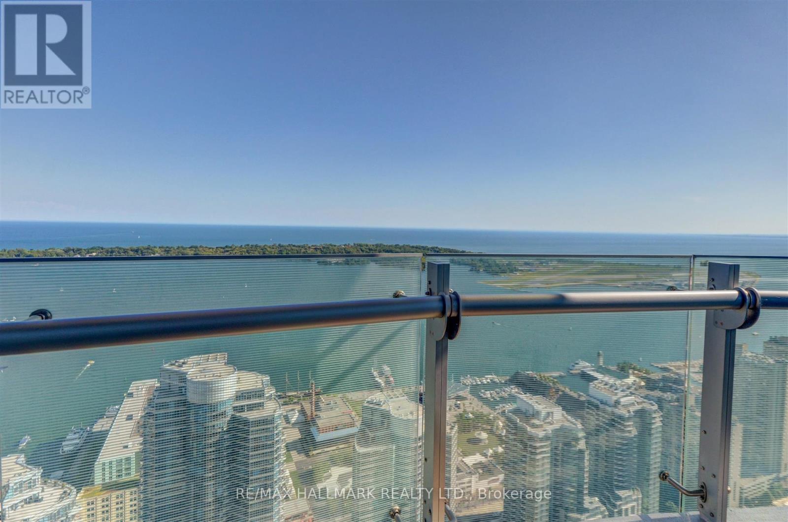 A view from a high-rise building looking out over a cityscape.