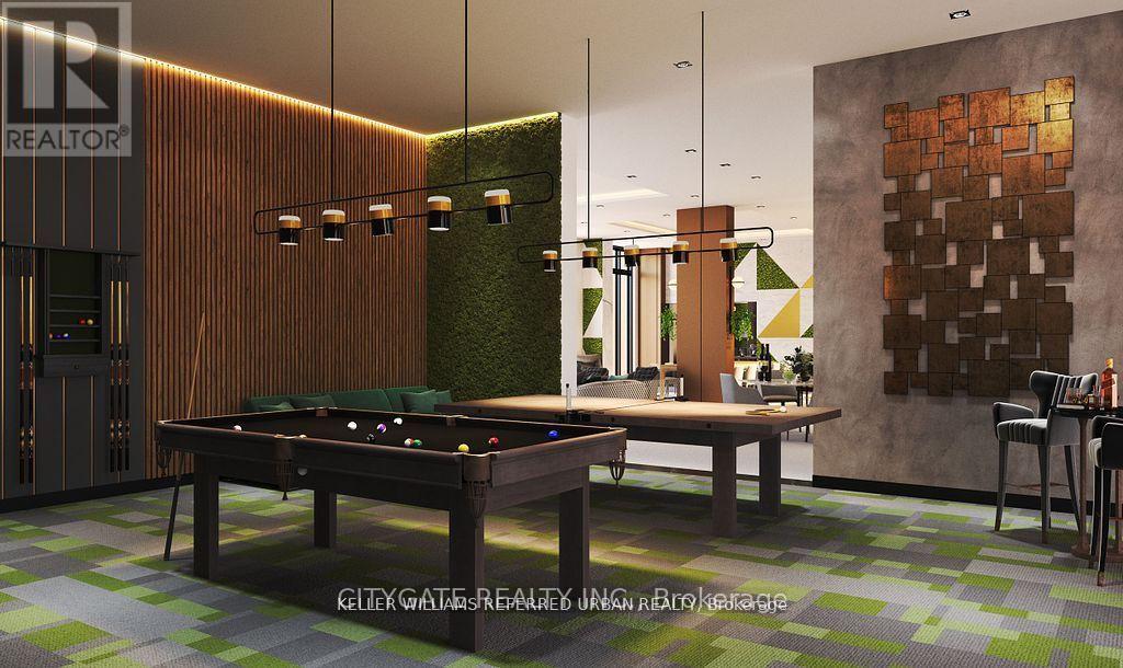 A pool table in a room with a green carpet.