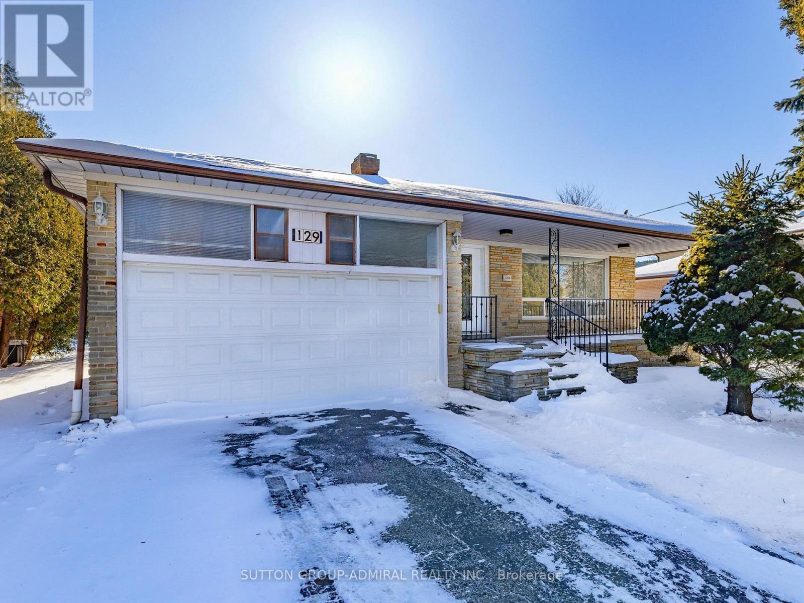A house numbered 11291 is shown with snow on the ground and a sunny sky.