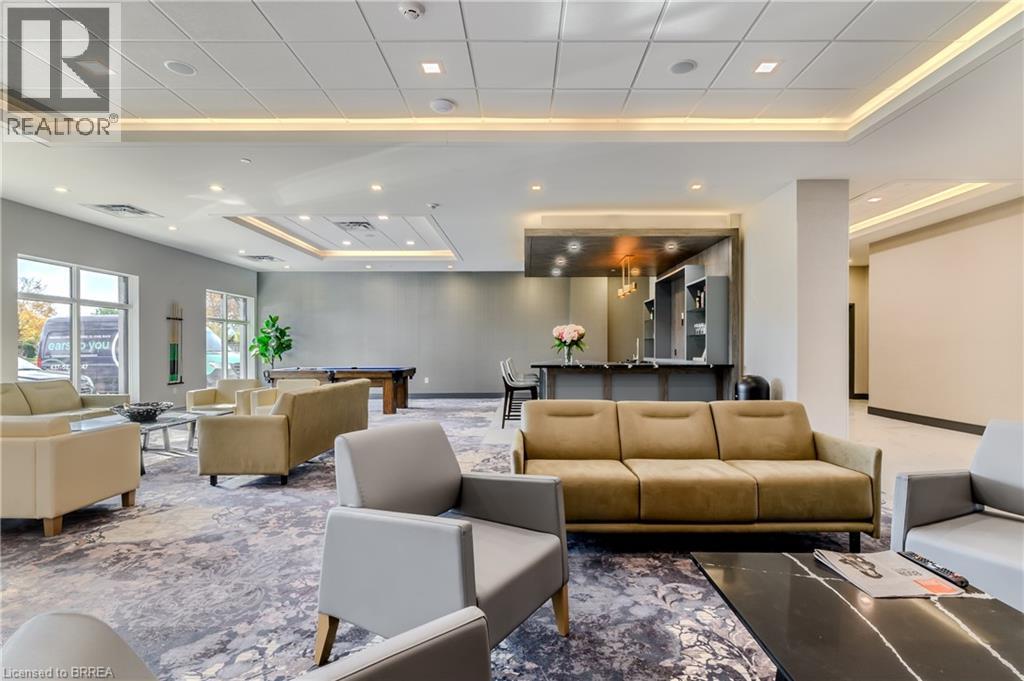 A living room with a couch, chairs, and a coffee table.