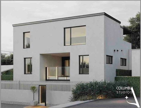 A modern house with a white exterior and a balcony on the second floor.