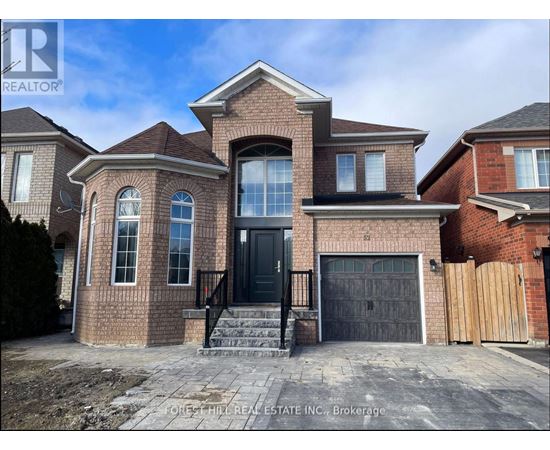 A brick house with a black front door and windows.