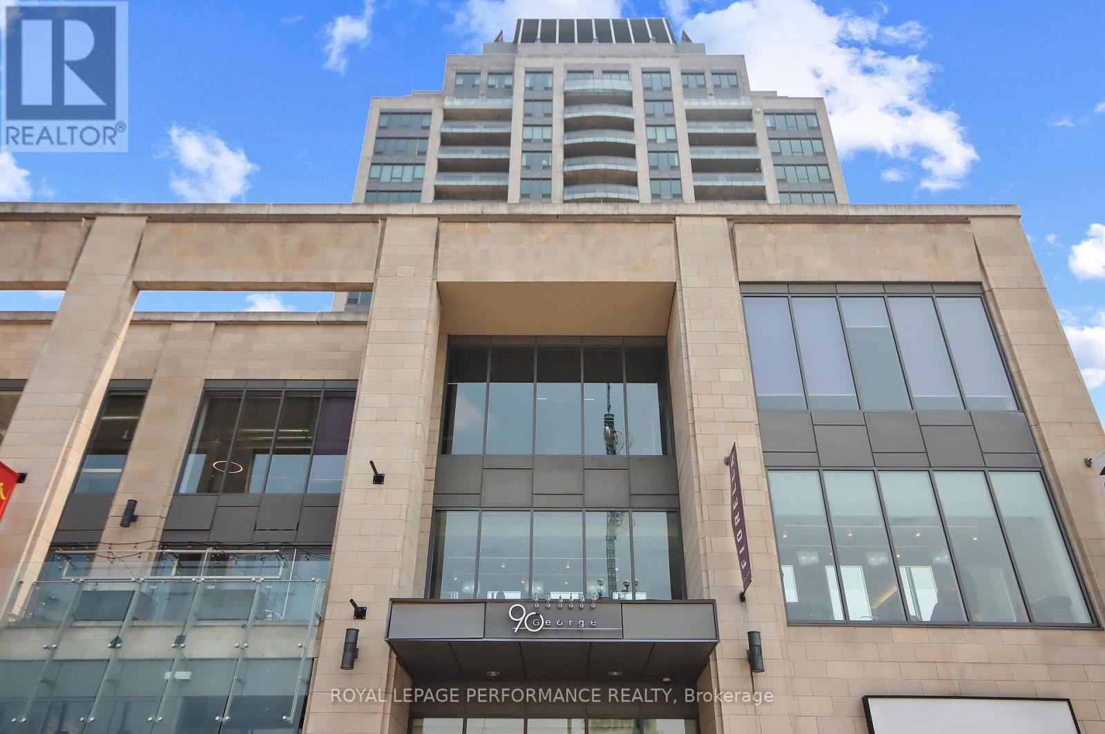 A building with the sign "Royal LePage Performance Realty Brokerage" on the front.