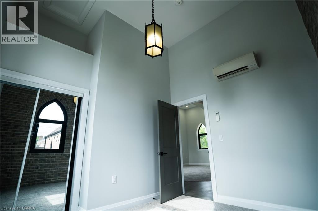 A room with a door and a window.