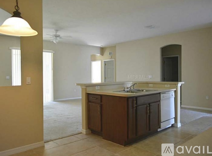 A kitchen with a sink and a dishwasher is available for rent.