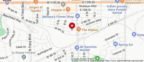 A map with a red dot in the middle of it.