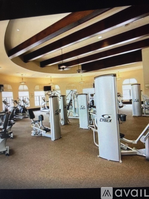 A gym with a variety of equipment including Cybex machines.