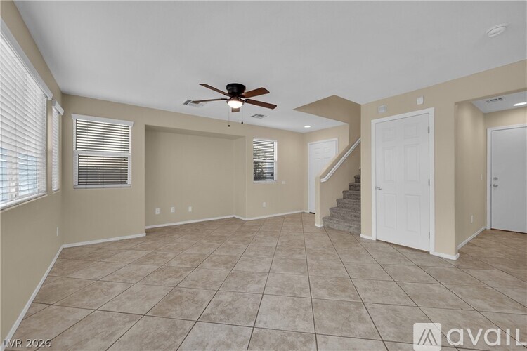 A kitchen with brown cabinets and a white countertop.