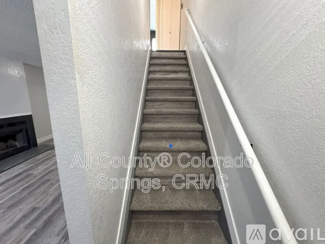 A staircase in a building with a text overlay.