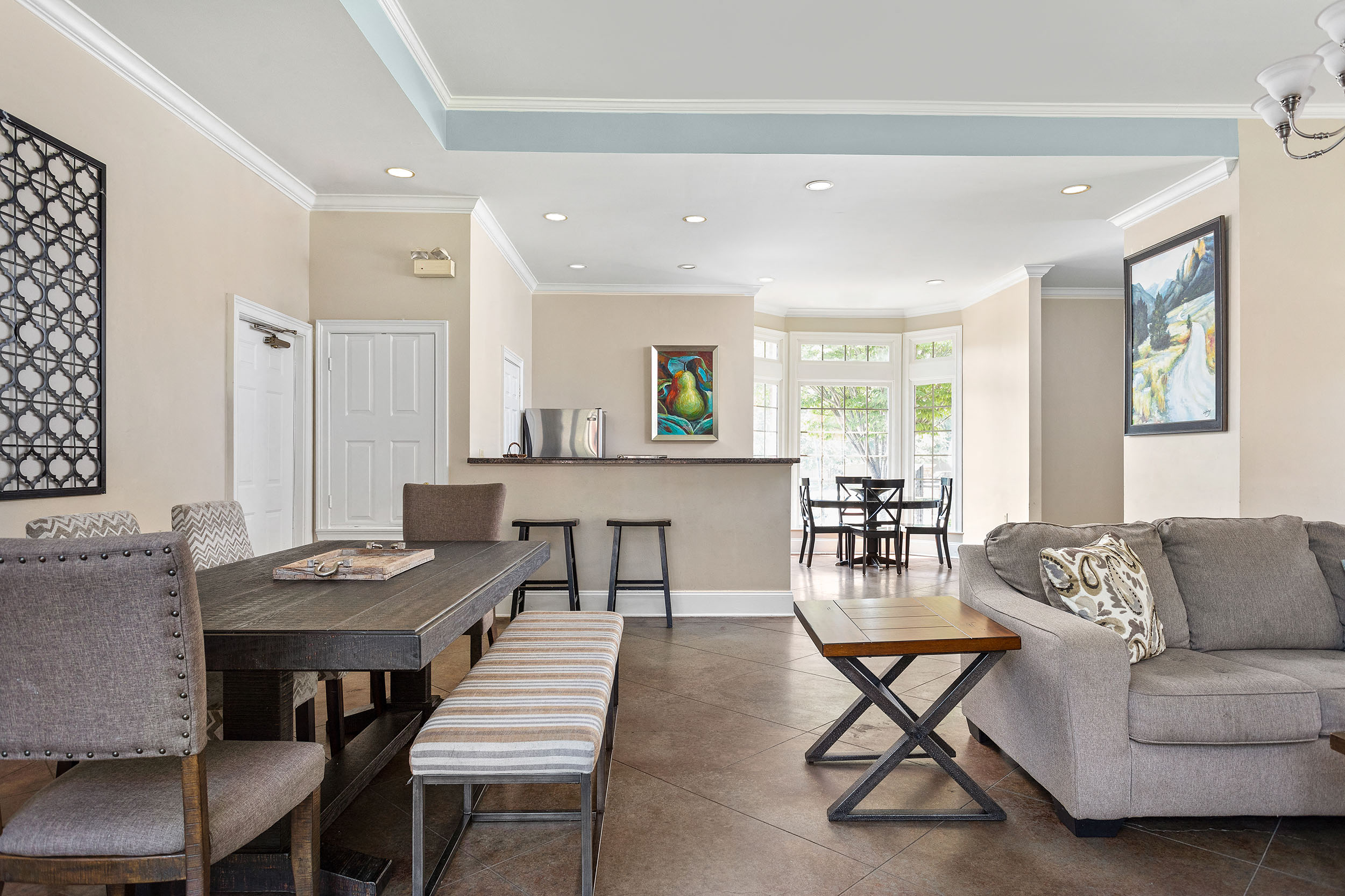 a living room with a couch and a table