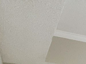 Newly Renovated Living Room - Walnut Hill Apartments Gorgeous, renovated living room with hardwood flooring, corner fireplace, and ceiling fan - Photo Gallery 2