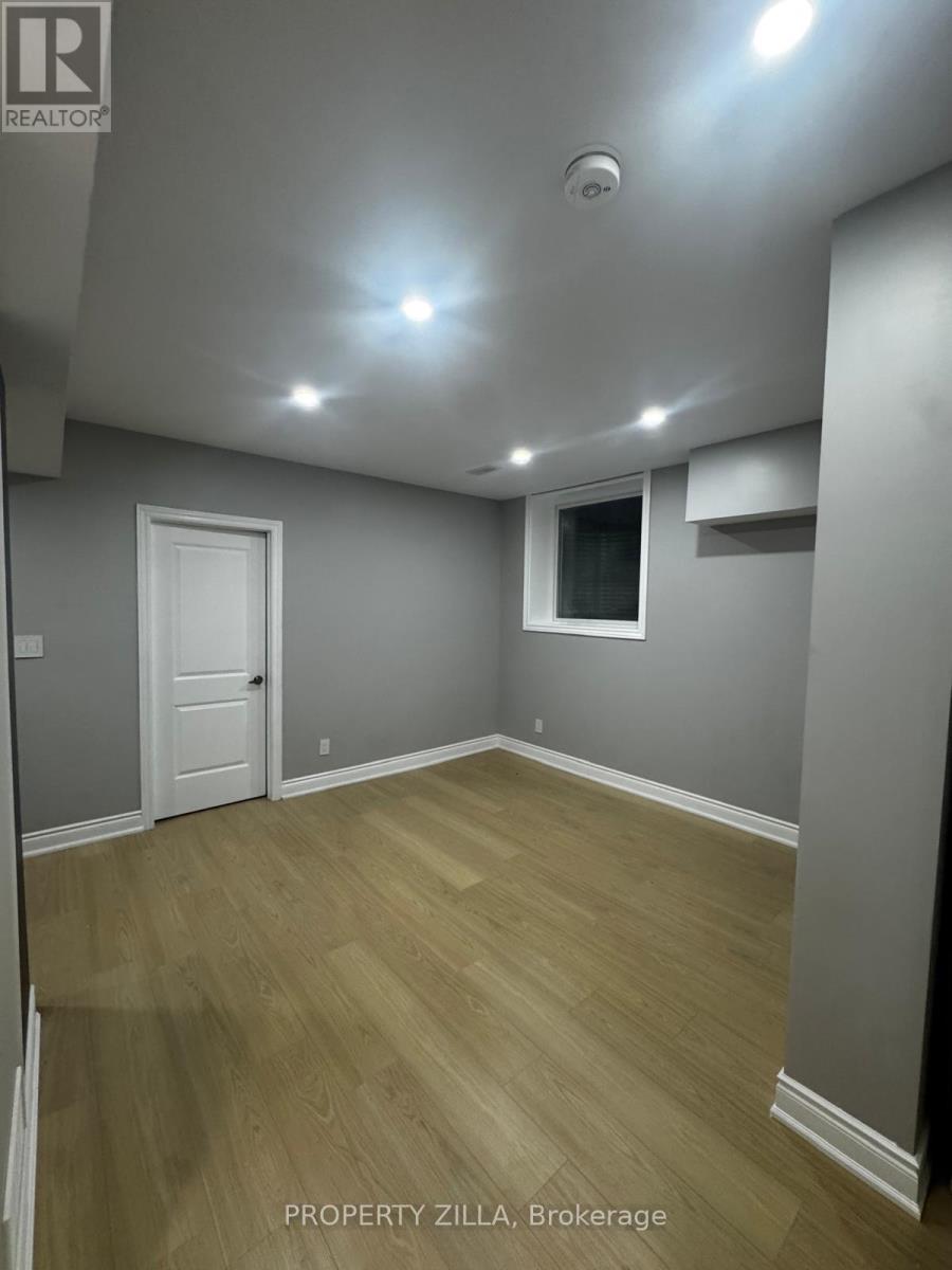 A room with a door and a window.