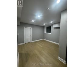 A room with a door and a window.