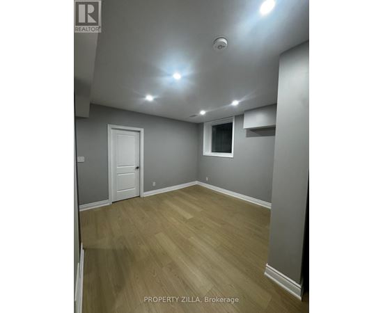 A room with a door and a window.